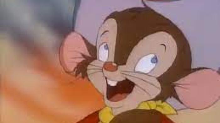 Fievel's American Tales: Close up of Fievel's head as he smiles wearing a cowboy hat.
