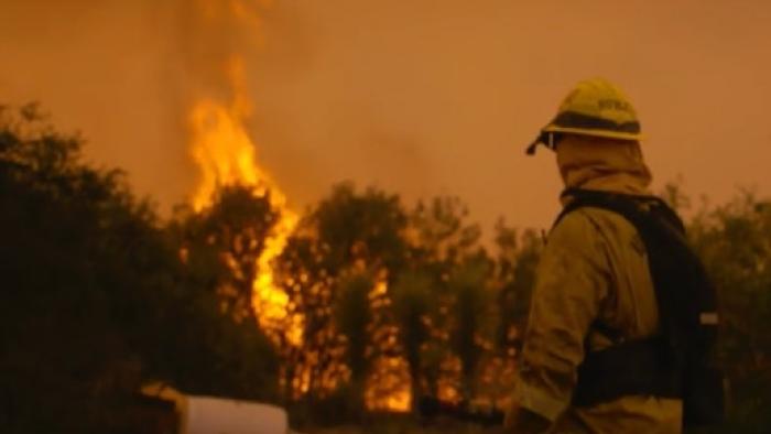 Fire Chasers TV Show: A firefighter prepared to go to the line
