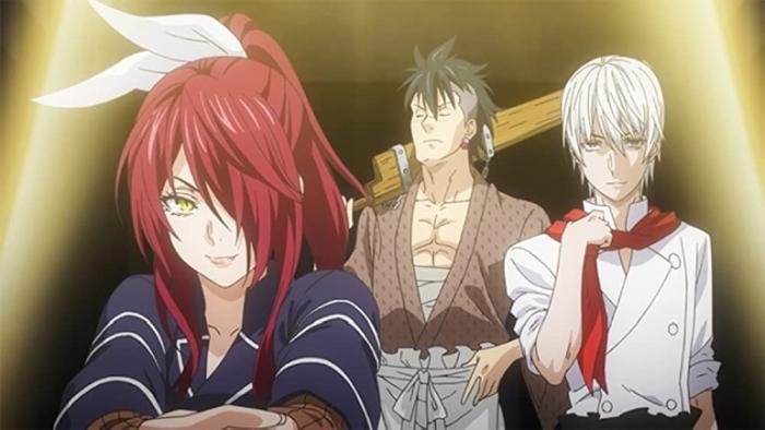 Food Wars: A group of three chefs, one woman and two men stand in a dark room underneath a spotlight, one of the men is holding a wooden sword.