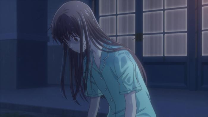 Fruits Basket: Tohru, looking stunned, drops to her knees in the rain