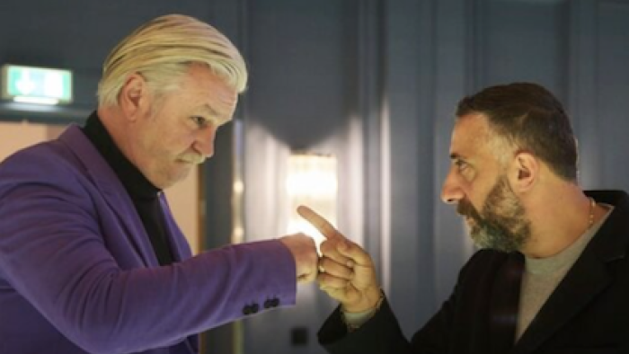 German Genius TV show screenshot 1: Movie actor and investor fist bumps with Ramadan. 