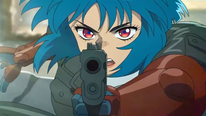 The Ghost in the Shell TV show screenshot 2: A blue-haired woman points a handgun during an action scene. 