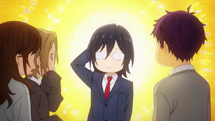 Horimiya TV show screenshot 3: Three friends look upon another friend with shocked expressions, the one everyone is looking at appears to be embarrassed with a glowing expression.