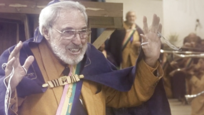 How I Escaped My Cult screenshot 3: Church of Yahweh leader Yisrayl Hawkins raises hands while proselytizing. 