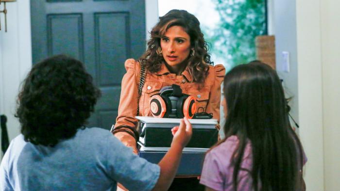 I Feel Bad TV Series: Emet walking in from work to deal with what's going on at home. 