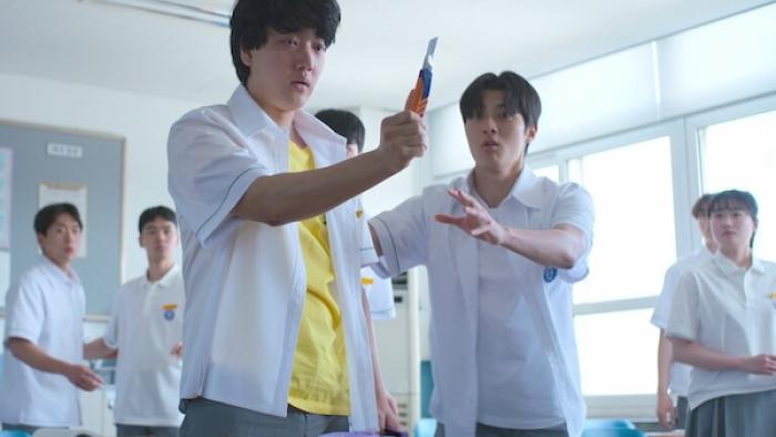 If Wishes Could Kill TV show screenshot 2: A teenage boy stands in the middle of class with a wild look on his face, holding up a box cutter