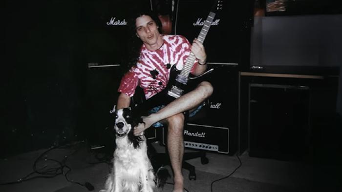 nto the Void TV show screenshot 2: Chuck Schuldiner of the band DEATH is shown in an old candid photo, sitting with legs crossed. 