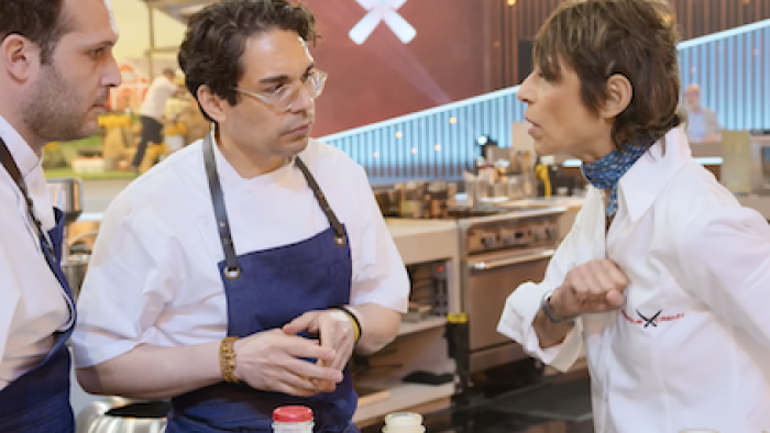 Iron Chef: Quest for an Iron Legend TV Show: A challenger gives instructions. 