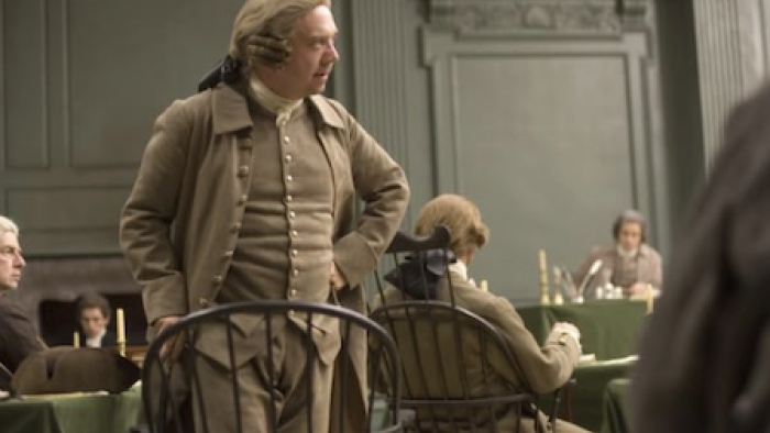 John Adams screenshot 2: John Adams standing and speaking to Continental Congress.