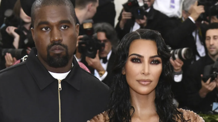 Kim vs. Kanye: The Divorce TV show screenshot 3: Kanye stands with Kim at Met Gala.