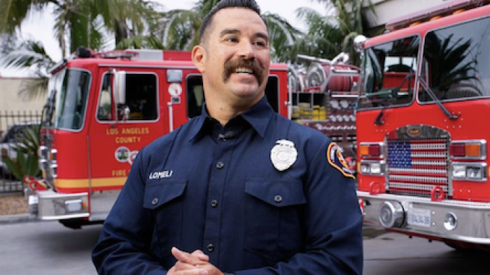 LA Fire & Rescue TV show screenshot 1: Fire Captain talks about station. 