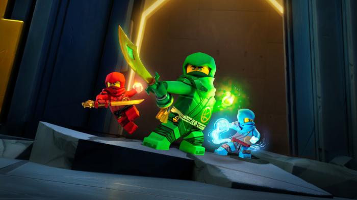 Ninjago Dragons Rising TV show screenshot 2: Red, green, and blue Ninjago warriors prepare to fight. 