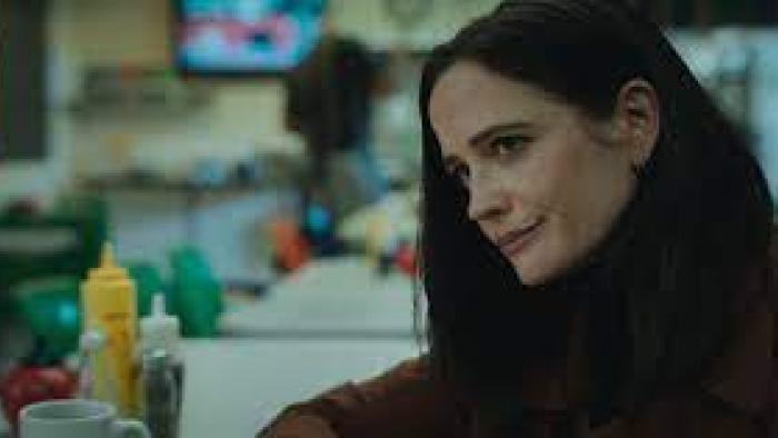 Liaison TV show: Eva Green grimaces at a diner