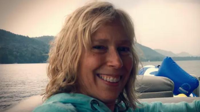 Little Miss Innocence: Passion. Poison. Prison: Close up picture of a white woman on a boat.