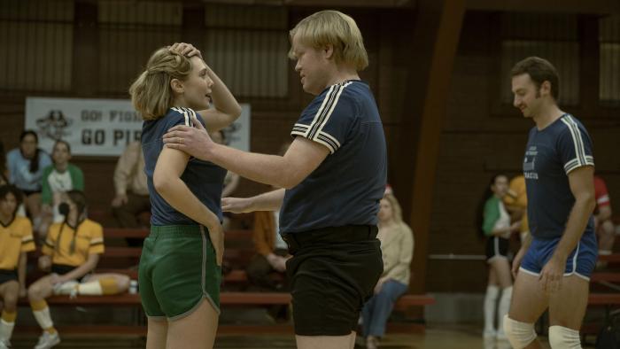 Love & Death TV show: a man comforts a woman during a volleyball game