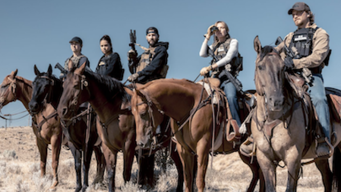 Marshals TV show screenshot 2: Kayce Dutton and the team side by side on horseback. 