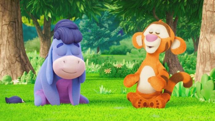 Me & Winnie The Pooh: Eeyore and Tiger are sitting outside with their eyes closed like they are medidating.