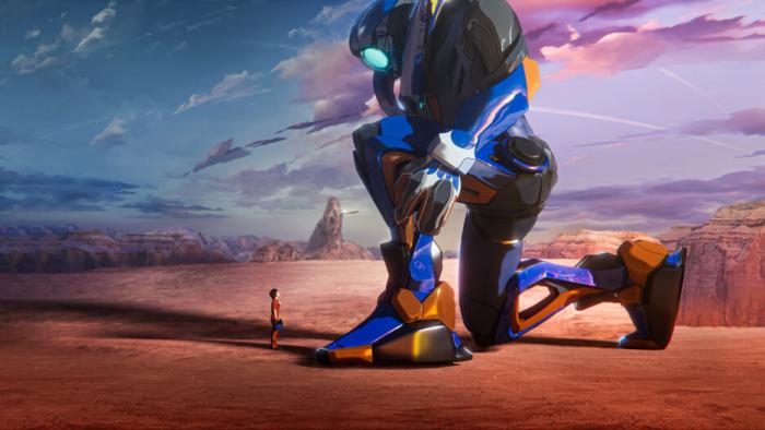 Mech Cadets screenshot 2: In a desert Stanford stands looking up at a gigantic Robo Mech with blue, silver, and gold armor on - who is kneeling down before him. 