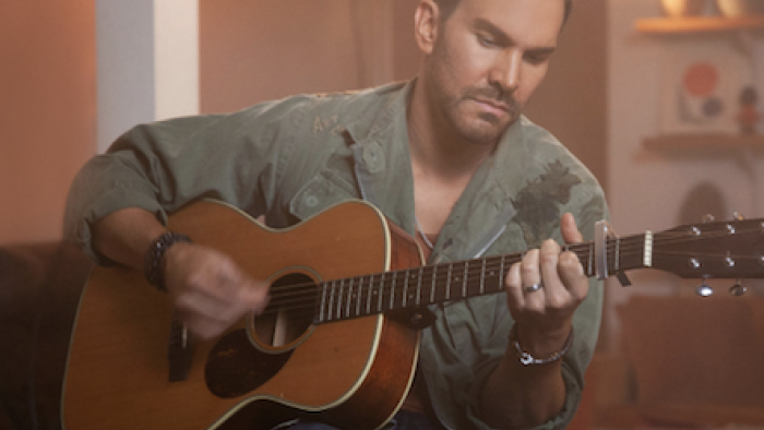 Playing guitar. 