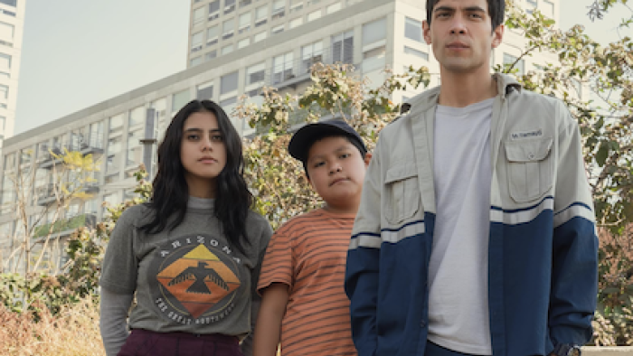 Midnight Family screenshot 3: Marigaby, Julito, and Marcus stand together.