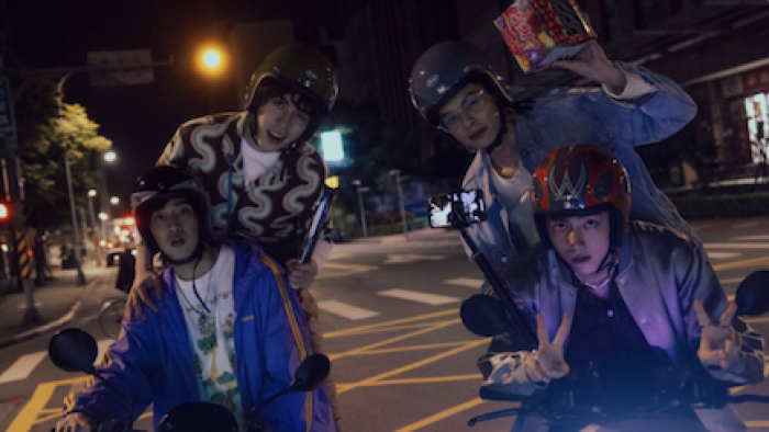 Million-Follower Detective TV show screenshot 3: Four influencers riding motor bikes at night. 