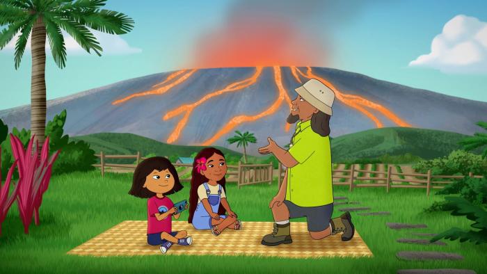 Molly's Epic Adventures TV: In Hawaii, Molly sits next to a friend, recording a Native kneeling and looking at the sky. A volcano erupts behind them.