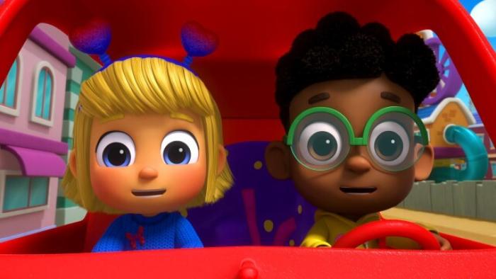Morphle Shorts TV: Close up of Mila and Jordie looking surprised as they ride inside Morphle who transformed into a car.