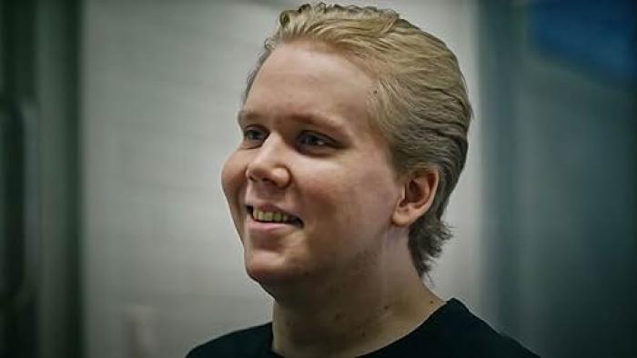 Most Wanted Teen Hacker TV show screenshot: Close up head shot nof Julius Kivimaki with his hair slicked back while in prison