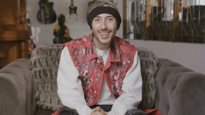 MTV’s Family Legacy TV show screenshot 2: Draven Bennington with black hat and red vest. 