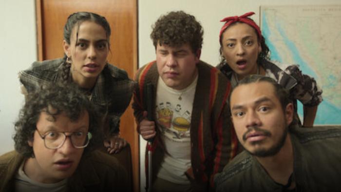 Nothing to See Here TV show screenshot 1: Alexis and his friends look surprised