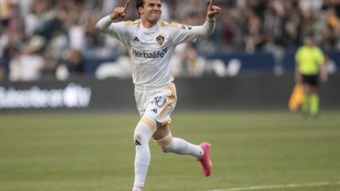 Onside: Major League Soccer TV show screenshot 1: Riqui Puig points his fingers up and smiles after scoring goal. 