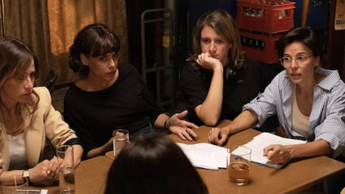 Past Lies screenshot 3: Rita (Elena Anaya) talks to other women around table. 
