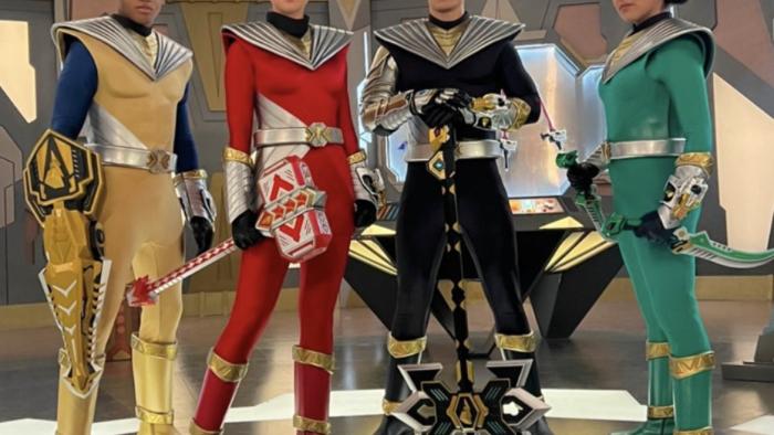 Power Rangers: Cosmic Fury: The yellow, red, black and green Power Rangers are shown standing together with their helmets off.