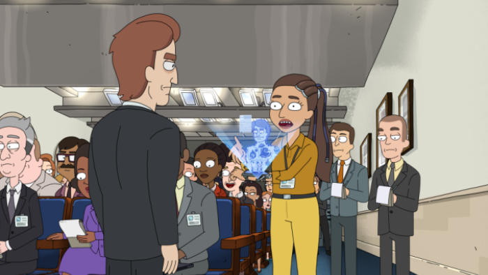 President Curtis TV show screenshot 3: At a political meeting, Banks holds a device that shows a hologram of O'Doyle