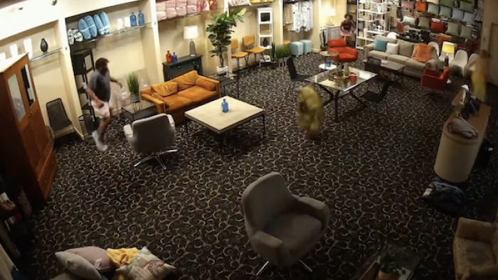Scare Tactics TV show screenshot 3: A man runs around inside a furniture showroom