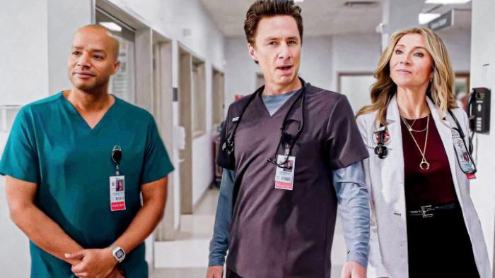 Scrubs TV show screenshot 1: Turk, J.D. and Elliott stand together in a hallway at Sacred Heart Hospital