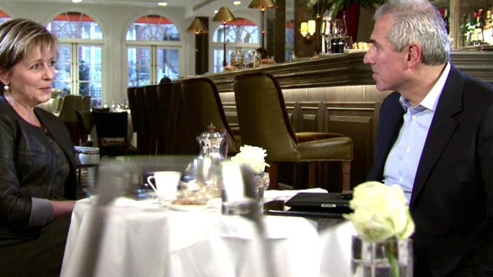 Selling London: A man and woman negotiate a property deal