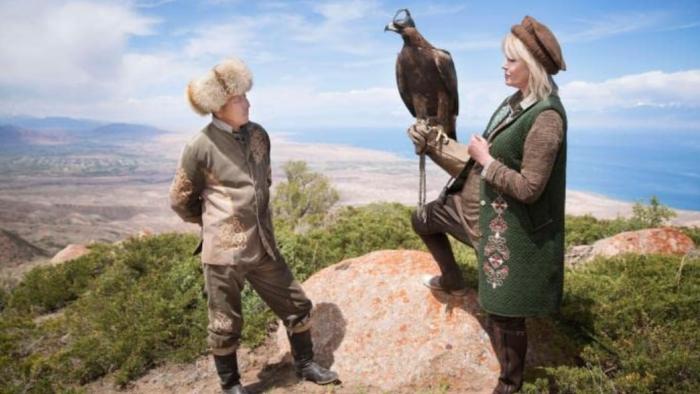 Joanna Lumley's Silk Road Adventure: Joanna Lumley with a bird of prey perched on her wrist standing next to a man
