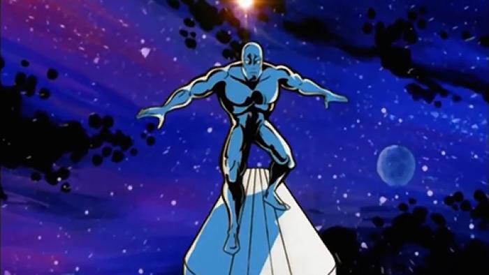 Silver Surfer TV show screenshot 3: Silver Surfer balances on his board on a shimmering purple and black space backdrop