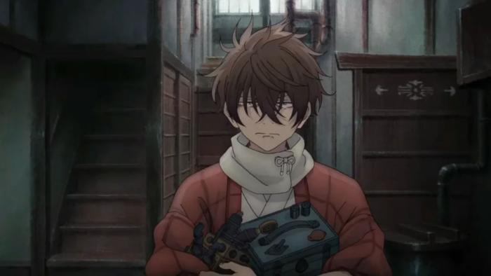 Sparks of Tomorrow TV show screenshot 1: A young man holds a mechanical device while standing inside a dimly lit building. 