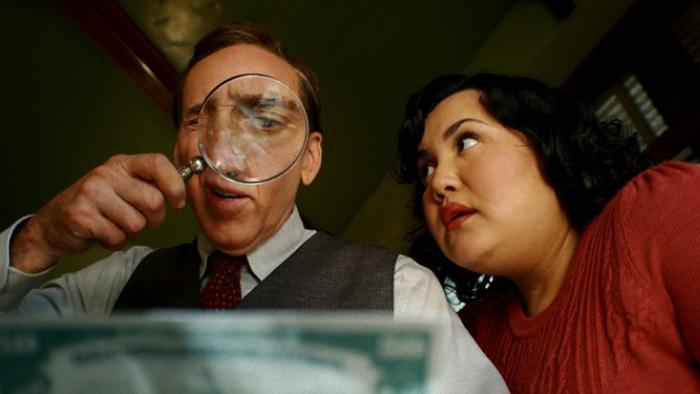 Spider-Noir TV show screenshot 3: Ben and assistant Janet investigate a hundred dollar bill