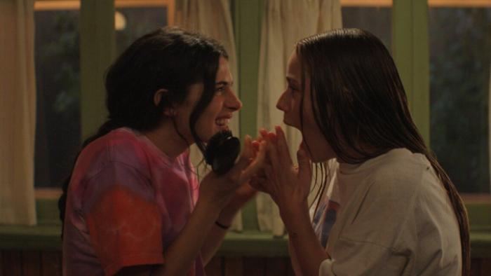 Sterling Point TV show screenshot 3: Annie and Ramona face each other, mouths open in shock or surprise; both have wet hair and are in damp T-shirts