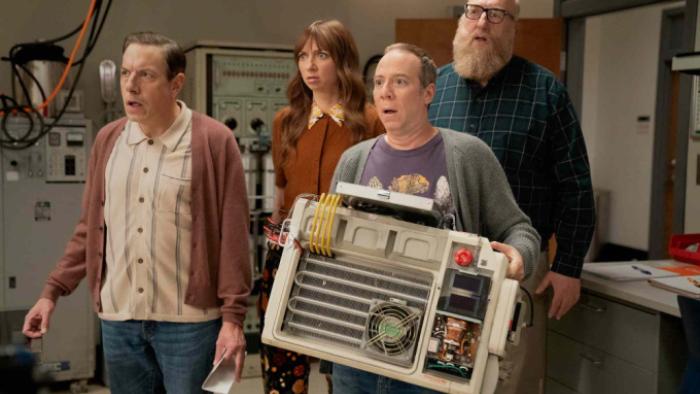 Stuart Fails to Save the Universe: Stuart, Bert, Barry and Denise stand together looking dismayed; Stuart holds the quantum entanglement device