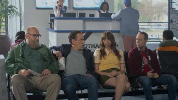 Stuart Fails to Save the Universe: Bert, Denise, Stuart and Barry sit in waiting room chairs in an office in front of a reception desk