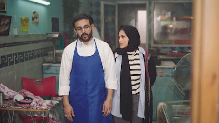 Tahir's House TV show screenshot 2: a mopey Tahir is consoled by his sister in the fish shop