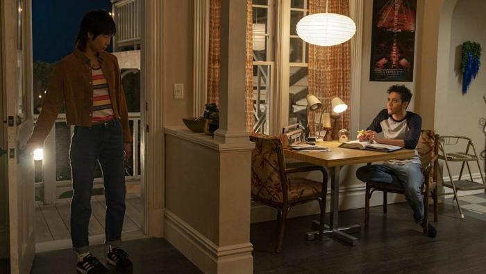 Tales of the City TV: Two young adults look at each other inside a Victorian-style house