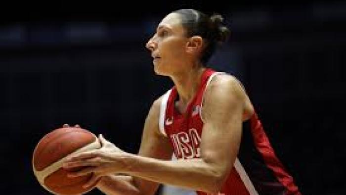 Taurasi TV show screenshot #1: Taurasi holds the ball on the court
