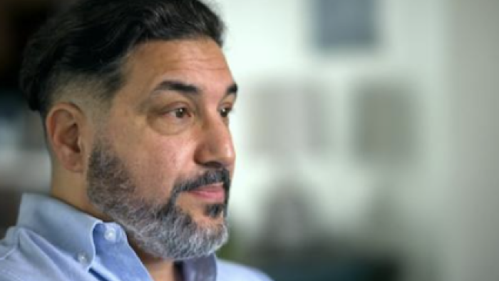 The Ashley Madison Afair screenshot 3: Profile of Charles Orlando sitting in collared shirt.