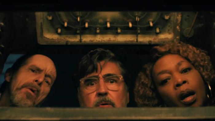 The Boroughs TV show screenshot 2: Wally, Sam and Judy peer into a hole and are seen from below; each looks both curious and frightened