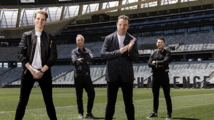 The Challenge: World Championship: Brihony Dawson, Marley, T.J. Lavin, Mark Wright standing on stadium field. 